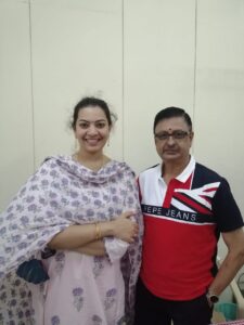 With singer Geeta Madhuri